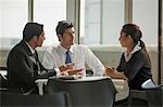 India, Three colleagues having discussion in office