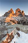 The lights of sunrise frames the Three Peaks of Lavaredo, Dolomites, Auronzo of Cadore, Veneto, Italy, Europe