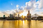 Sunset, Brisbane city with the sun hidden behind the Story Bridge, Brisbane, Queensland, Australia, Pacific