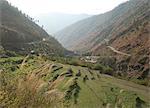 Gamri Chhu River running through the Trashigang Valley past terraced hills of rice fields, Eastern Bhutan, Asia