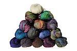 Set of colorful wool yarn balls. Hanks are set out in a pile.