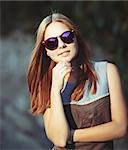 beautiful teenage girl in sunglasses.  Summer picture.