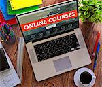 Online Courses on Laptop Screen. Distance Learning Concept.