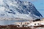 Snow covered waterfront and mountain, Borg, Lofoten Islands, Norway