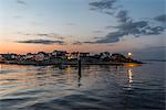 Coastal buildings at sunset