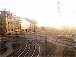 Tram tracks in city with the Liseberg Wheel in the foreground in Gothenburg, Sweden