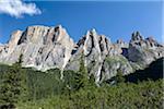 Scenic view of mountains with rocky towers at the beginning of the Lastes valley, a wild and uncrowded place into the heart of the massif of Sella, Dolomites, Trentino Alto Adige, Italy