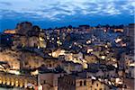 Overview of Sassi di Matera at dusk, one of the three oldest cities in the world, Basilicata, Italy