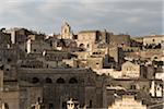 Buildings on upper side of the Sassi, Matera, one of the three oldest cities in the world, Basilicata, Italy