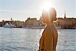 Young woman looking at city view