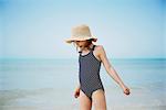 Girl wading in sea