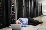 Technician napping in server room