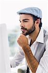 Focused man working on computer