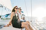 Couple enjoying view on sailboat, San Diego Bay, California, USA