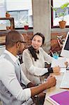 Man and woman communicating at office