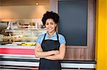 Pretty waitress smiling at camera