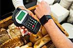 Customer paying with smart watch