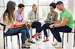 Students sitting in circle working together