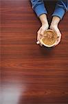 Woman having a cappuccino