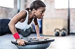 Muscular woman doing fitness workout