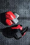 Boxing gloves on studio floor