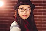 Attractive hipster posing with glasses