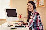 Young creating woman typing a keyboard