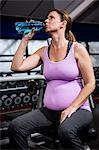 Pregnant woman drinking water