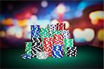 Poker chips with blur background on table in casino