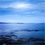 Peaceful Sea Landscape. Long Exposure. Mysterious Calm Water. Square Toned Photo with Copy Space.