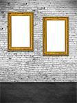 Two hollow frames on white brick wall