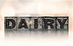 The word "DAIRY" written in vintage ink stained letterpress type.
