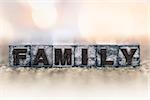 The word "Family" written in vintage ink stained letterpress type.
