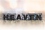 The word "HEAVEN" written in vintage ink stained letterpress type.