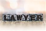 The word "LAWYER" written in vintage ink stained letterpress type.