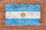 Flag of Argentina painted on old brick wall