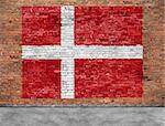 Flag of Denmark painted on old brick wall