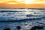 rocky beal beach near ballybunion on the wild atlantic way ireland with a beautiful yellow sunset