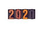 The word "2020" written in isolated vintage wooden letterpress type on a white background.