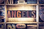 The word "Angels" written in vintage wooden letterpress type.