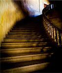 Old staircase made of pure white marble in gothic mood