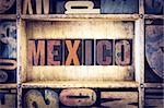 The word "Mexico" written in vintage wooden letterpress type.