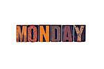 The word "Monday" written in isolated vintage wooden letterpress type on a white background.
