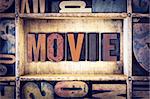 The word "Movie" written in vintage wooden letterpress type.