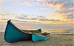 Two fisherman boats at sunrise time