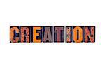 The word "Creation" written in isolated vintage wooden letterpress type on a white background.