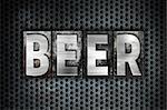 The word "Beer" written in vintage metal letterpress type on a black industrial grid background.