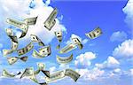 Flying banknotes of dollars on blue sky background