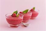 Raspberry mousse in glass bowls