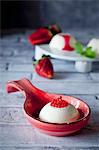 Panna cotta with raspberry caviar, Italy